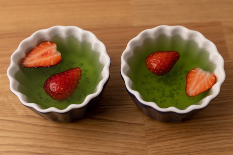 Two jelly desserts with strawberries