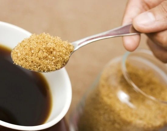 Add a tablespoon of brown sugar to a cup of coffee