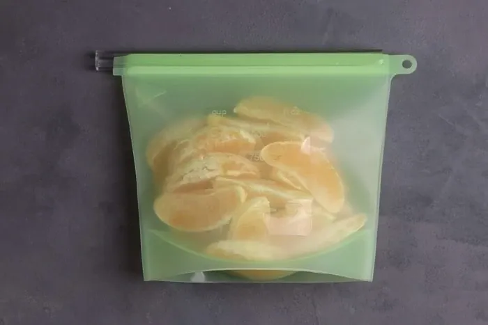 gajos de naranja envasados para congelar 2